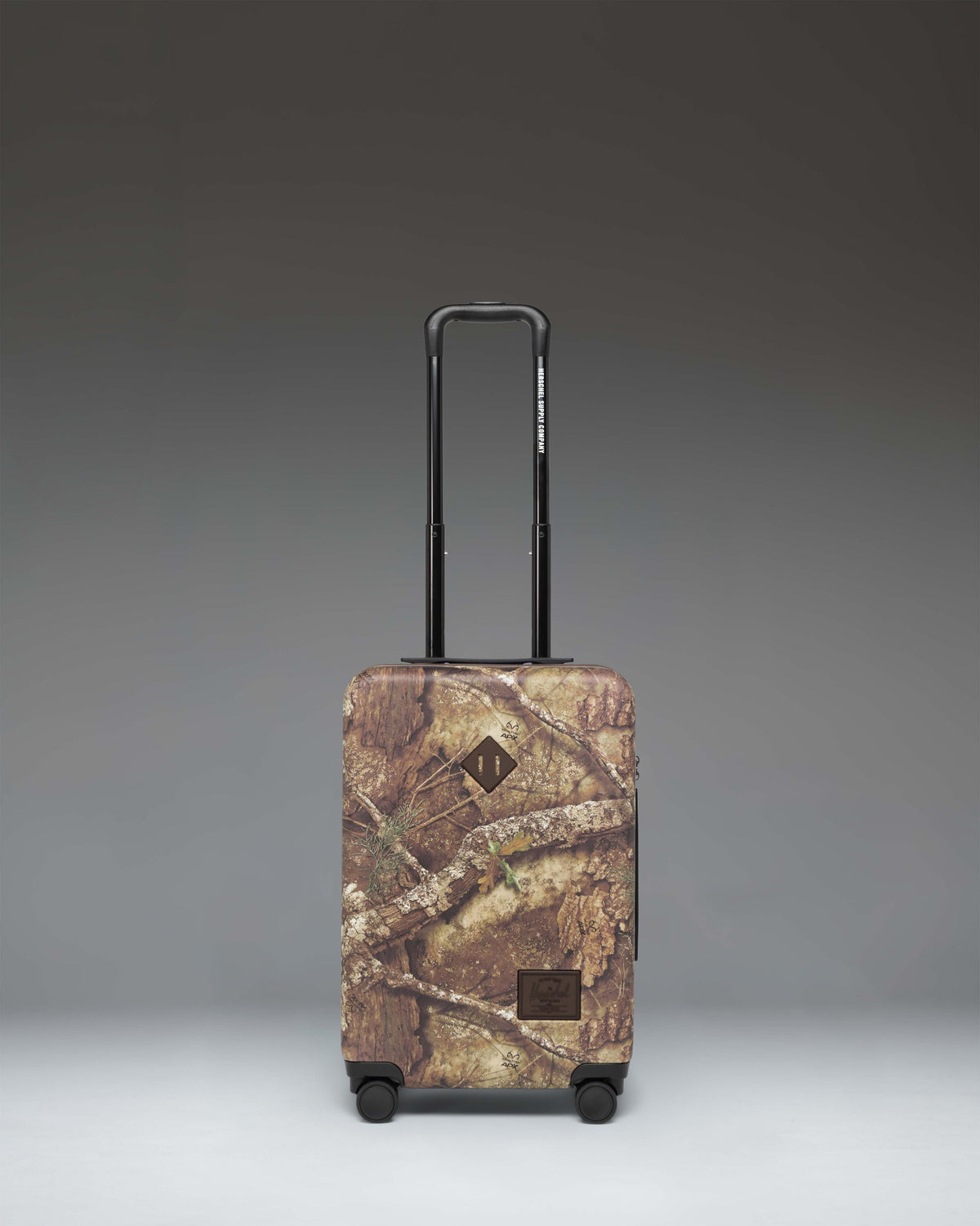 Realtree® Herschel Heritage™ Large CO Luggage