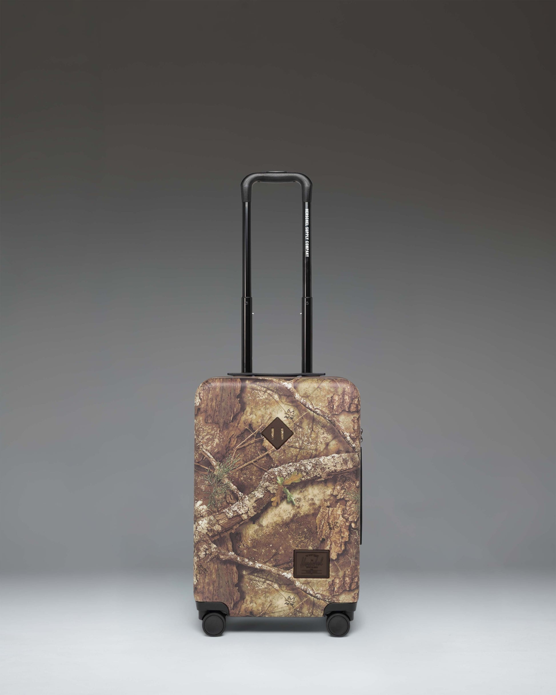 Realtree® Herschel Heritage™ Large CO Luggage