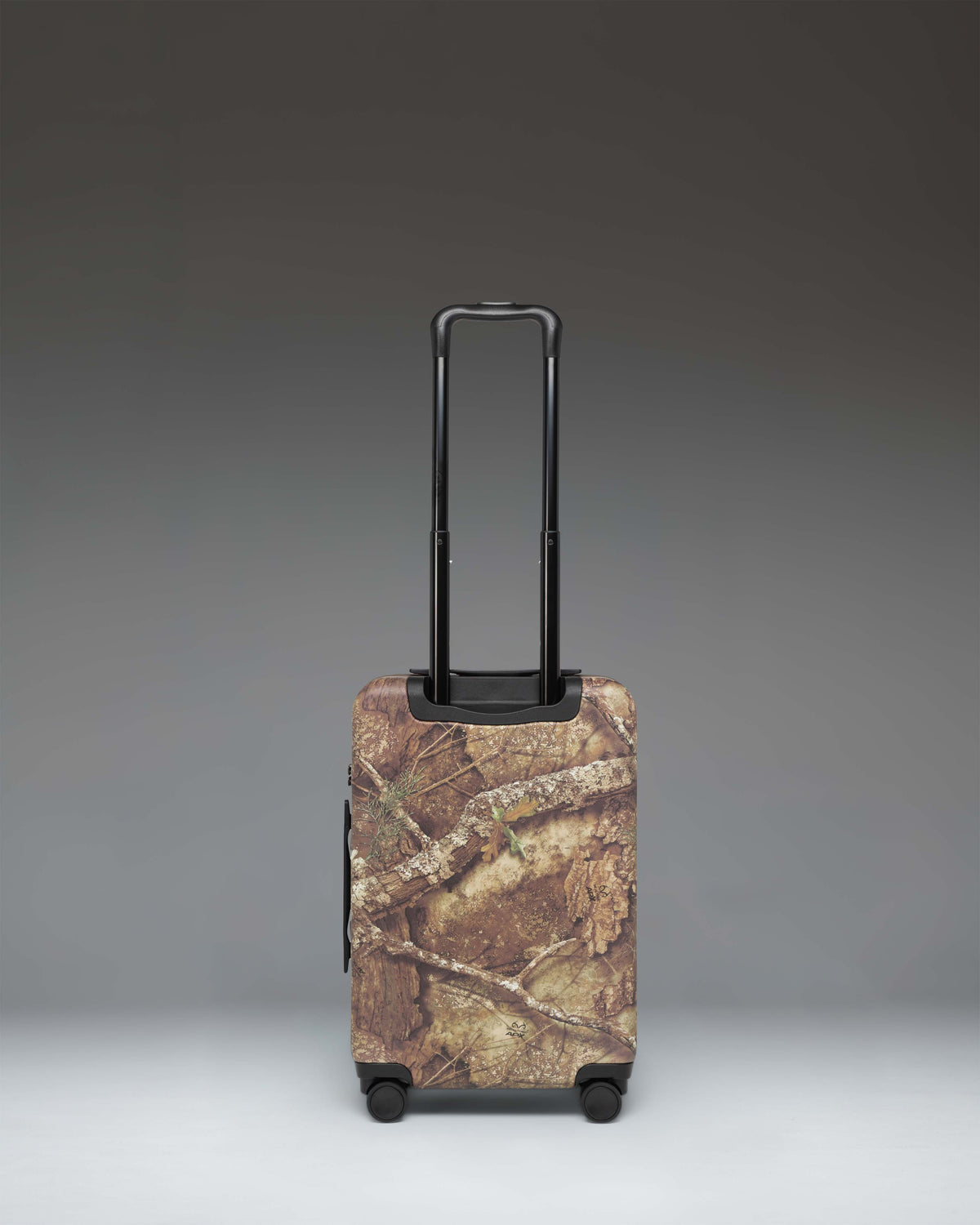 Realtree® Herschel Heritage™ Large CO Luggage